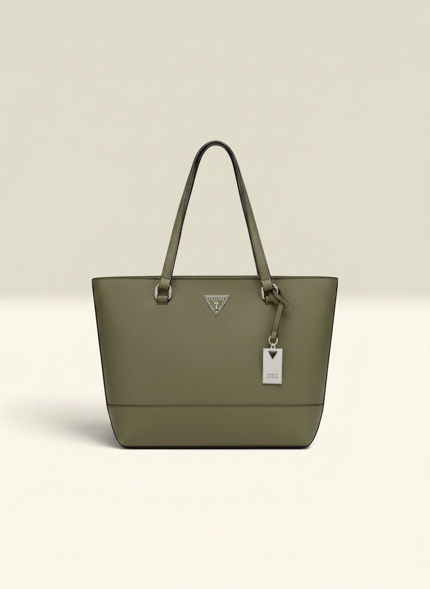 THE GOOD FIND Guess green tote bag with silver logo and charm. Durable and stylish for daily use.