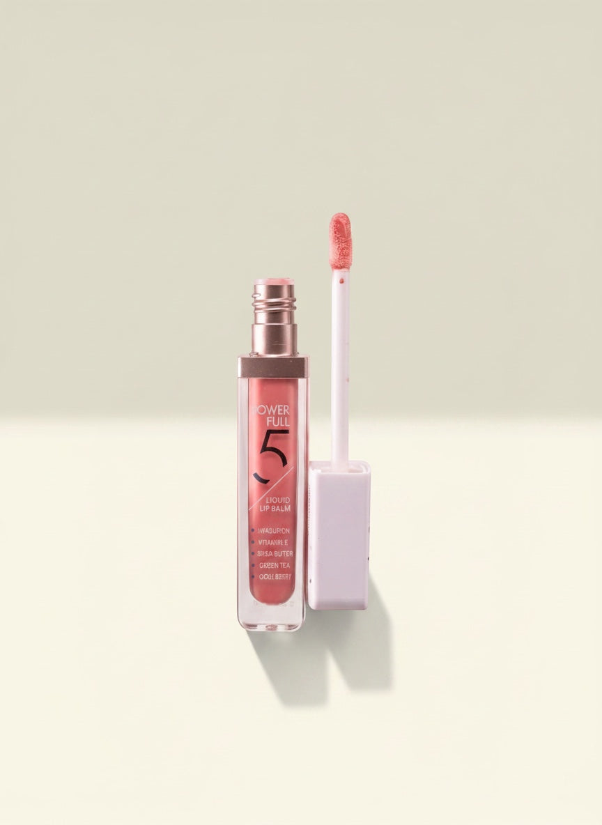 THE GOOD FIND Power Full Liquid Lip Balm in a peachy-pink shade, infused with hyaluronic acid, vitamin E, shea butter, green tea, and goji berry.