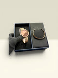 THE GOOD FIND watch and bracelet set with rose gold-tone case, two-tone dial, and mesh strap, plus a gold-tone cuff bracelet.