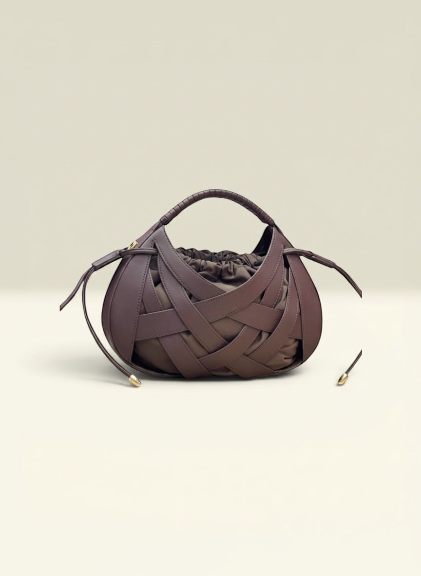 THE GOOD FIND woven leather drawstring handbag in deep brown with gathered interior and top handle.